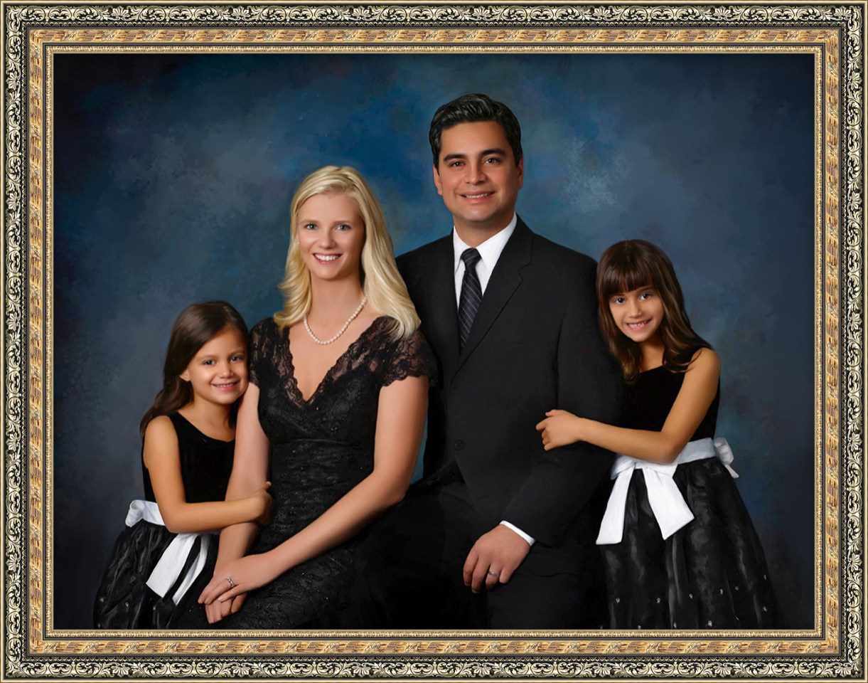 Framed portrait of a family of four.